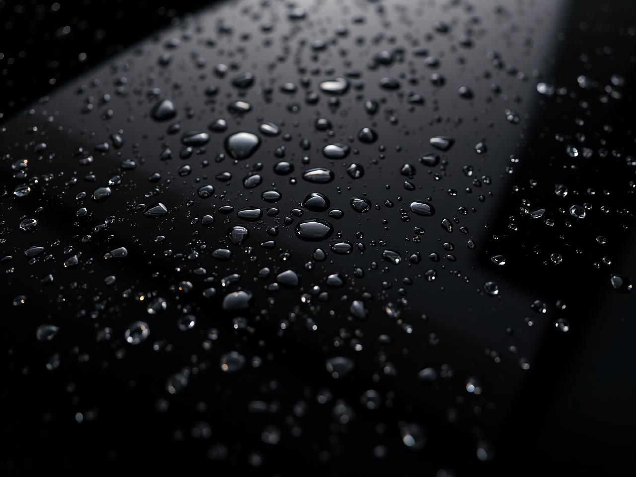 Water beading on freshly ceramic-coated black paint
